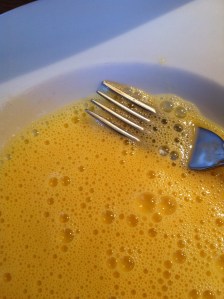 Beaten up eggy for dipping to make the flour and breadcrumbs stick
